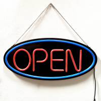 Skilt med teksten OPEN 49x23cm i r&oslash;d og bl&aring; LED neon lys