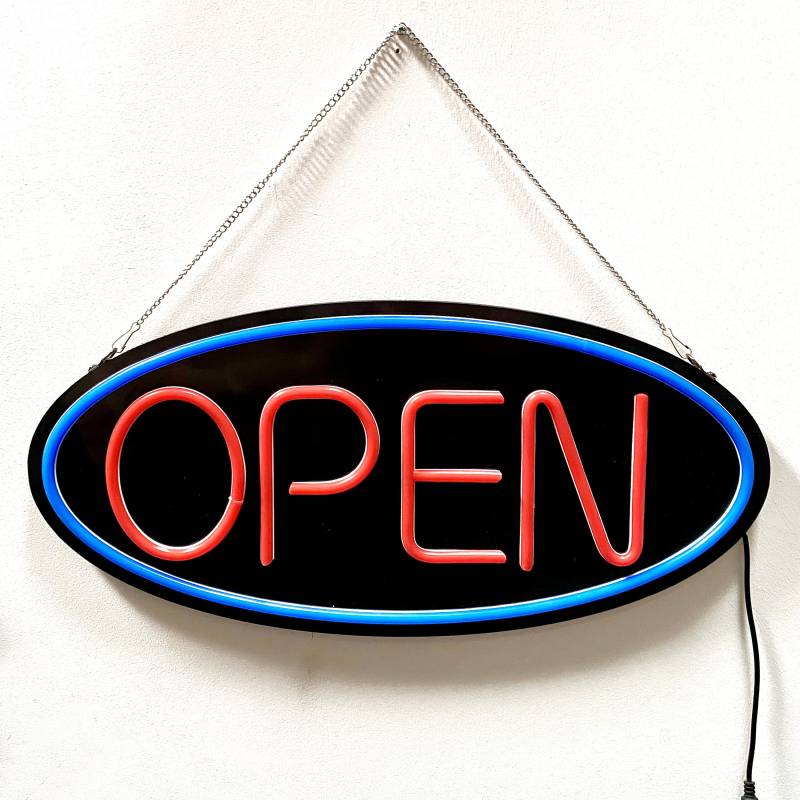 Skilt med teksten OPEN 49x23cm i r&oslash;d og bl&aring; LED neon lys