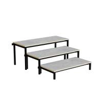 Idol b&aelig;nk med 3 trappe sektioner i lys gr&aring; linoleum og sort stel 